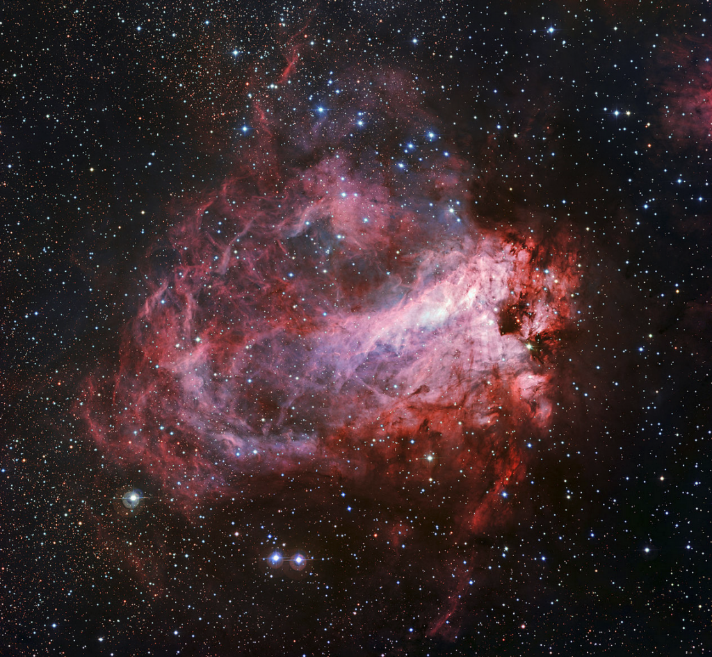 This image of the rose-coloured star forming region Messier 17 was captured by the Wide Field Imager on the MPG/ESO 2.2-metre telescope at ESO’s La Silla Observatory in Chile. 